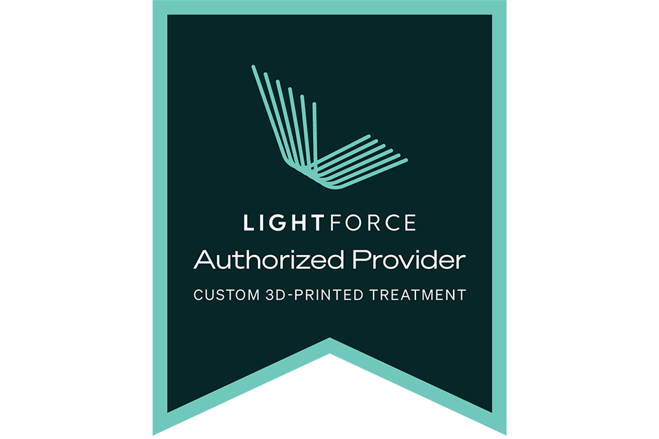 LightForce authorized dealer badge